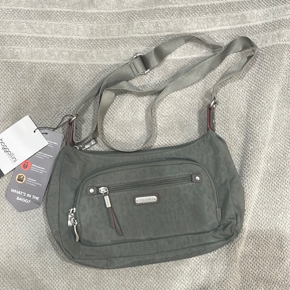 Baggallini Handbags - Baggallini. Brand new with tags. Grey with subtle cheetah print background.